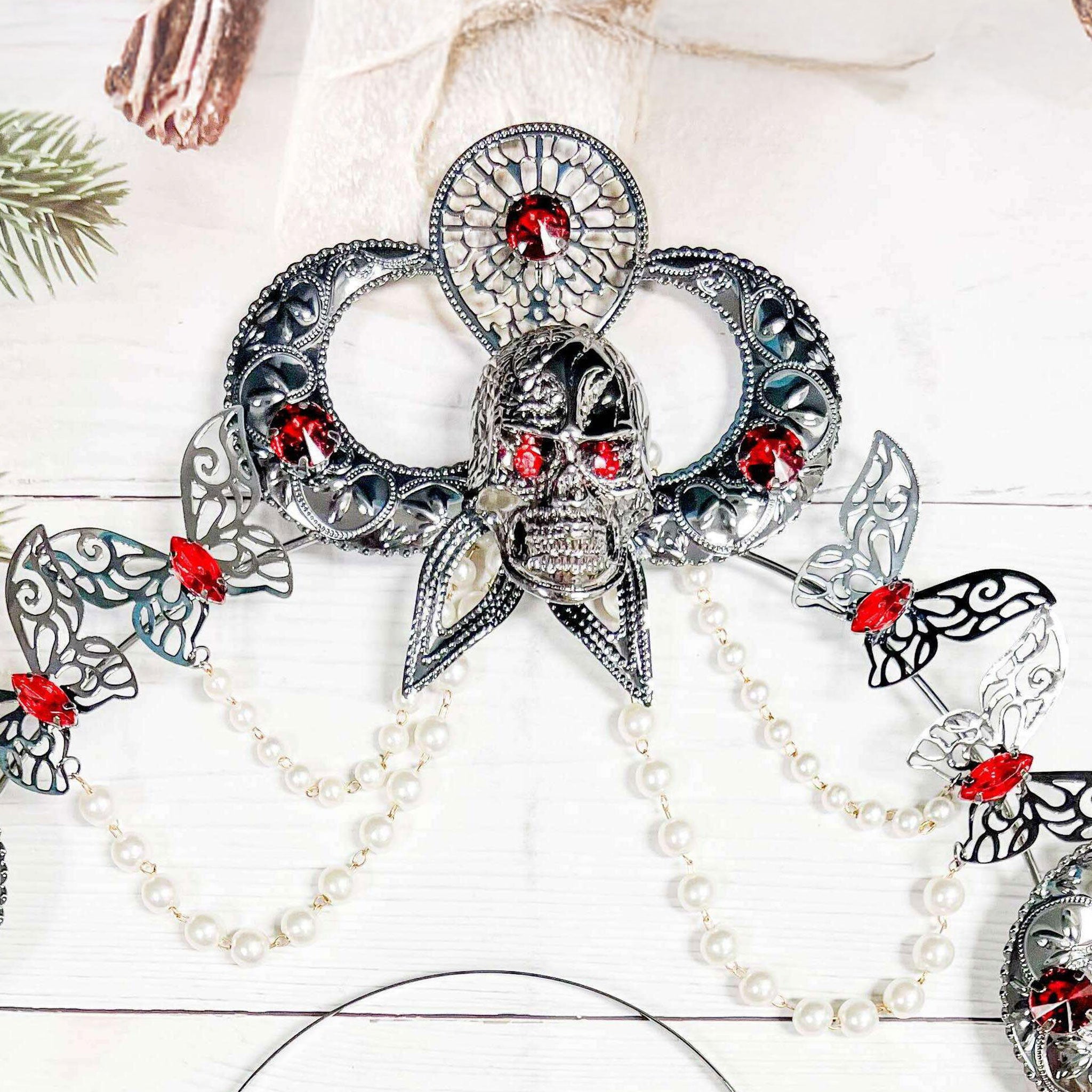 Metallic acrylic accessories headband head-band headgear head-gear head-piece headpiece crown halo skull butterfly butterflies moon crescent-moon pearl pearl-strand faux-pearls ruby rubies faux-gems goth gothic gothic-doll sparkling shiny dark-elegance elegant intricate fierce costume cosplay halloween birthday prom pageant queen king regal female femme feminine womens unisex silver white red