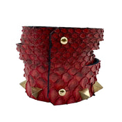 Leather textured-leather accessories arm-gear bracelet cuff wide-cuff animal snake-textured studs studded tetrahedron triangle triangle-studs spike-studs spike spikes spiked rebellion rebellious striking elegant powerful power fierce contrasting fetish-inspired fetish fashion alt-fashion streetwear dark-streetwear unisex red gold