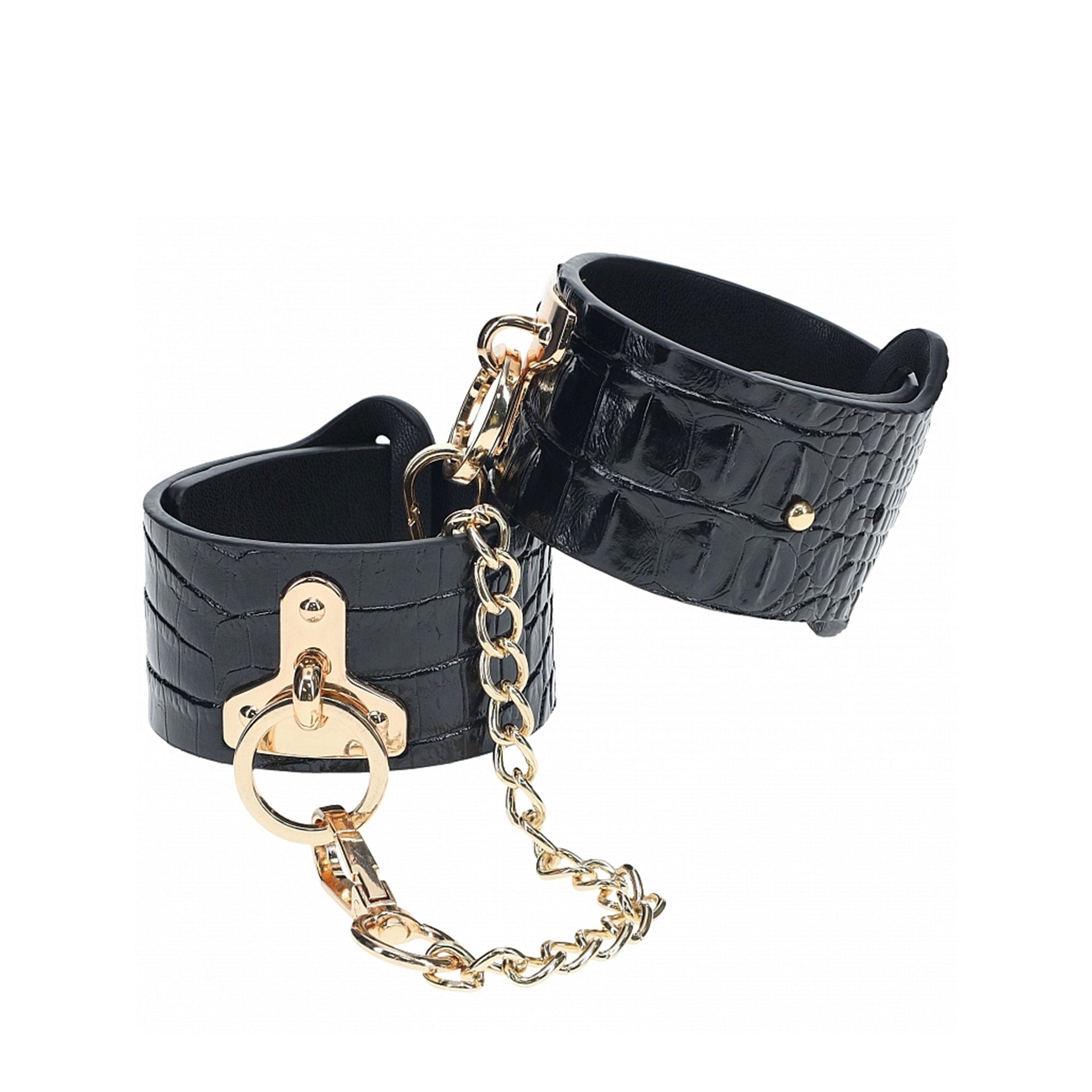 Leather bonded cuffs ankle croc crocodile scale reptile embossed peg closure low-profile linking chain adjustable durable comfortable bdsm bondage restraints fetish fashion glamorous luxurious rome black gold