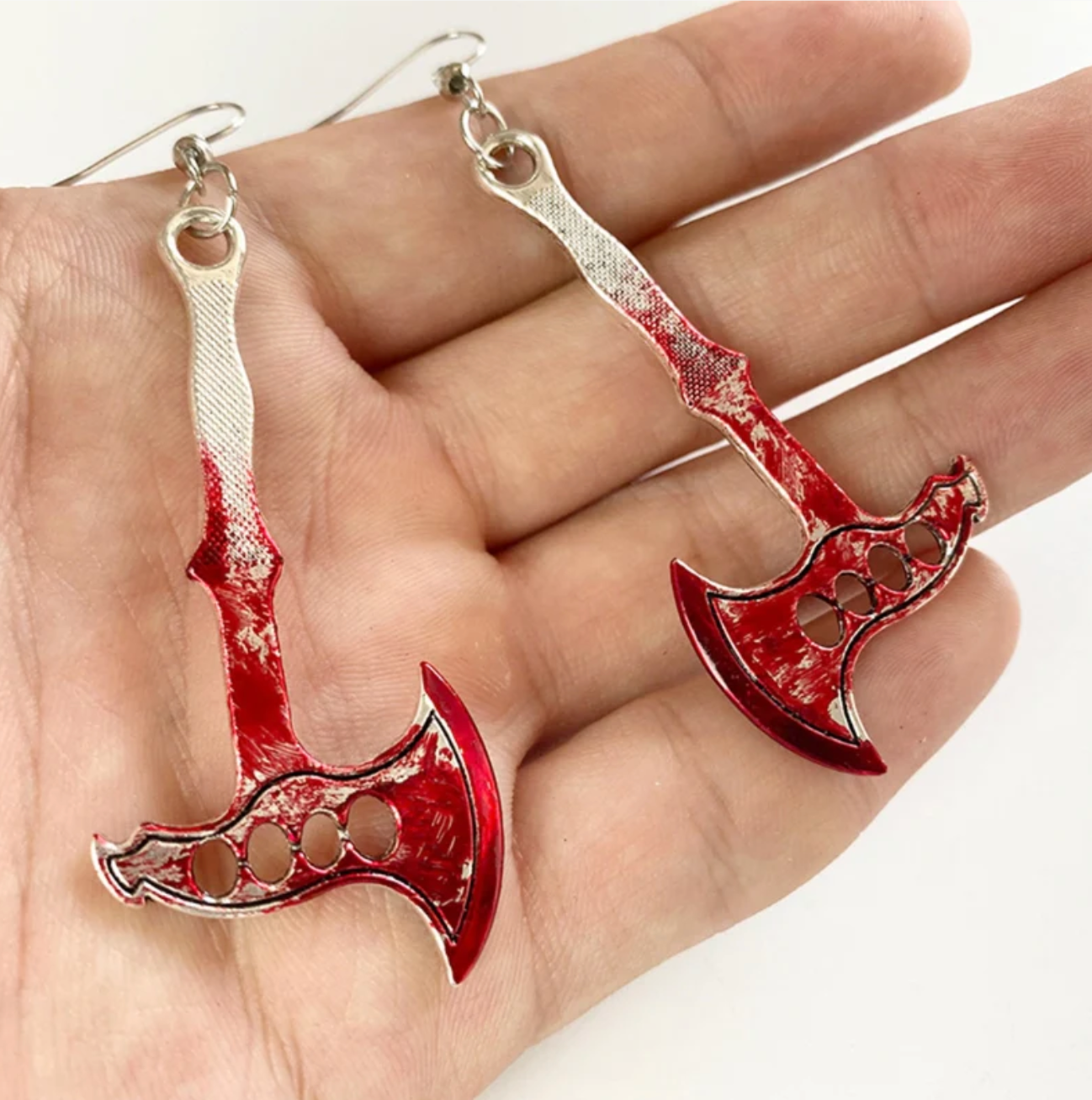 Bloody Axe Earrings horror jewelry, bold and edgy red axe design, perfect for Halloween, gothic accessories, killer statement earrings, sharp and bold earrings for horror lovers.