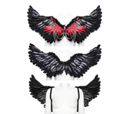 Feather wings harness black and red, sexy harness with chains and feathers, gothic angel wings costume accessory, feathered wings harness for festivals, black and red feather wings with chain details.