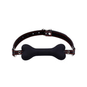Silicone leather faux-leather accessories restraints gag mouth-gag bone-shape bone dog-bone adjustable buckle locking lockable comfortable fun fetish fashion alt-fashion alternative bedroom dungeon festival festivalwear bondage bdsm bdsm-gear bdsm-toys kink kinky kinky-play kinky-toys pet pet-play pet-training pup puppy-play dog puppy animals costume cosplay halloween adult-toys unisex black red-stitching