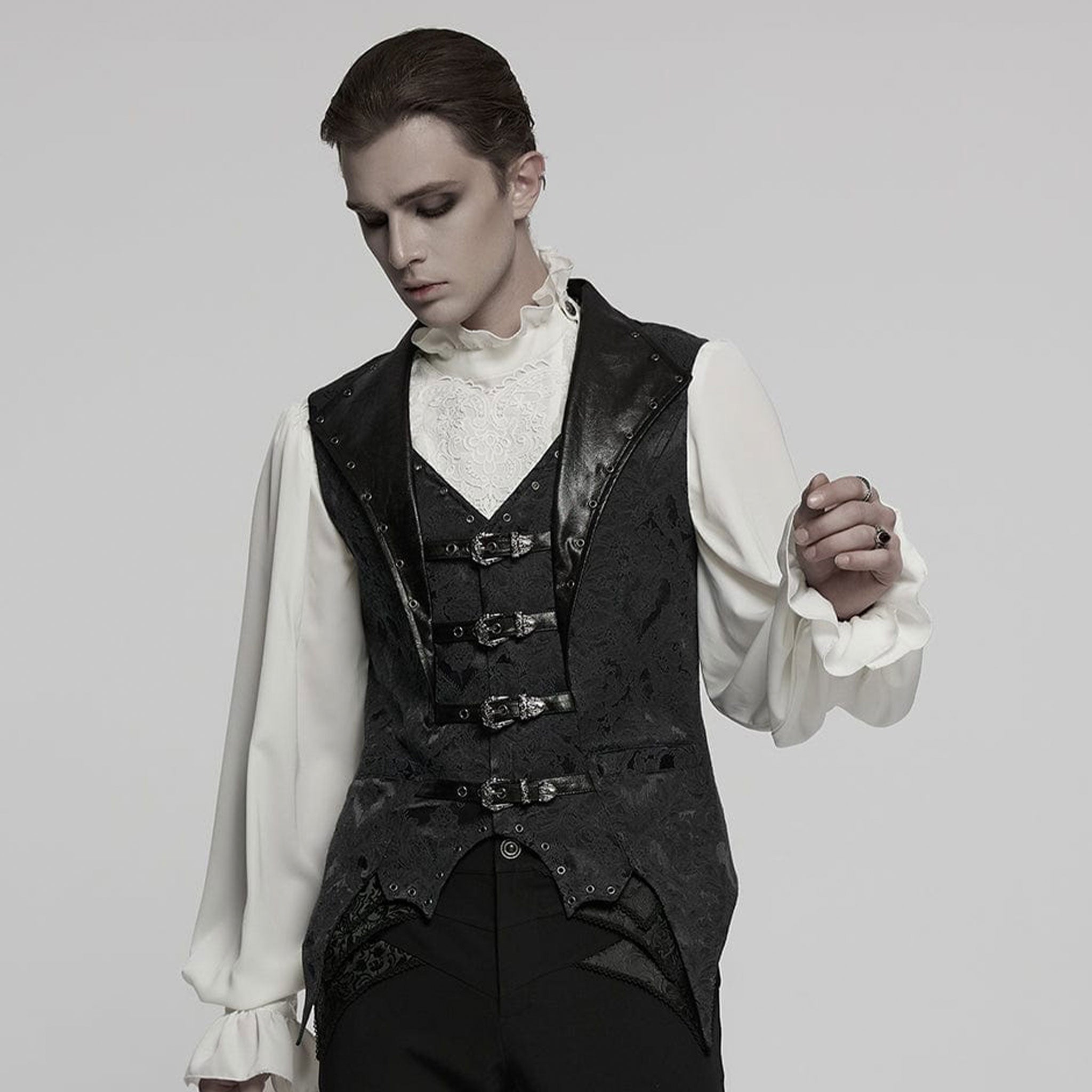 Polyester cotton elastane Spandex embroidered-fabric jacquard brocade leather faux-leather textured floral top outerwear vest waistcoat buckle-front adjustable scalloped-hem long-points elongated tailored-fit fashion alternative alt-fashion goth gothic victorian victorian-inspired steampunk costume cosplay halloween vampire batwing male masculine masc mens menswear guys dudes black