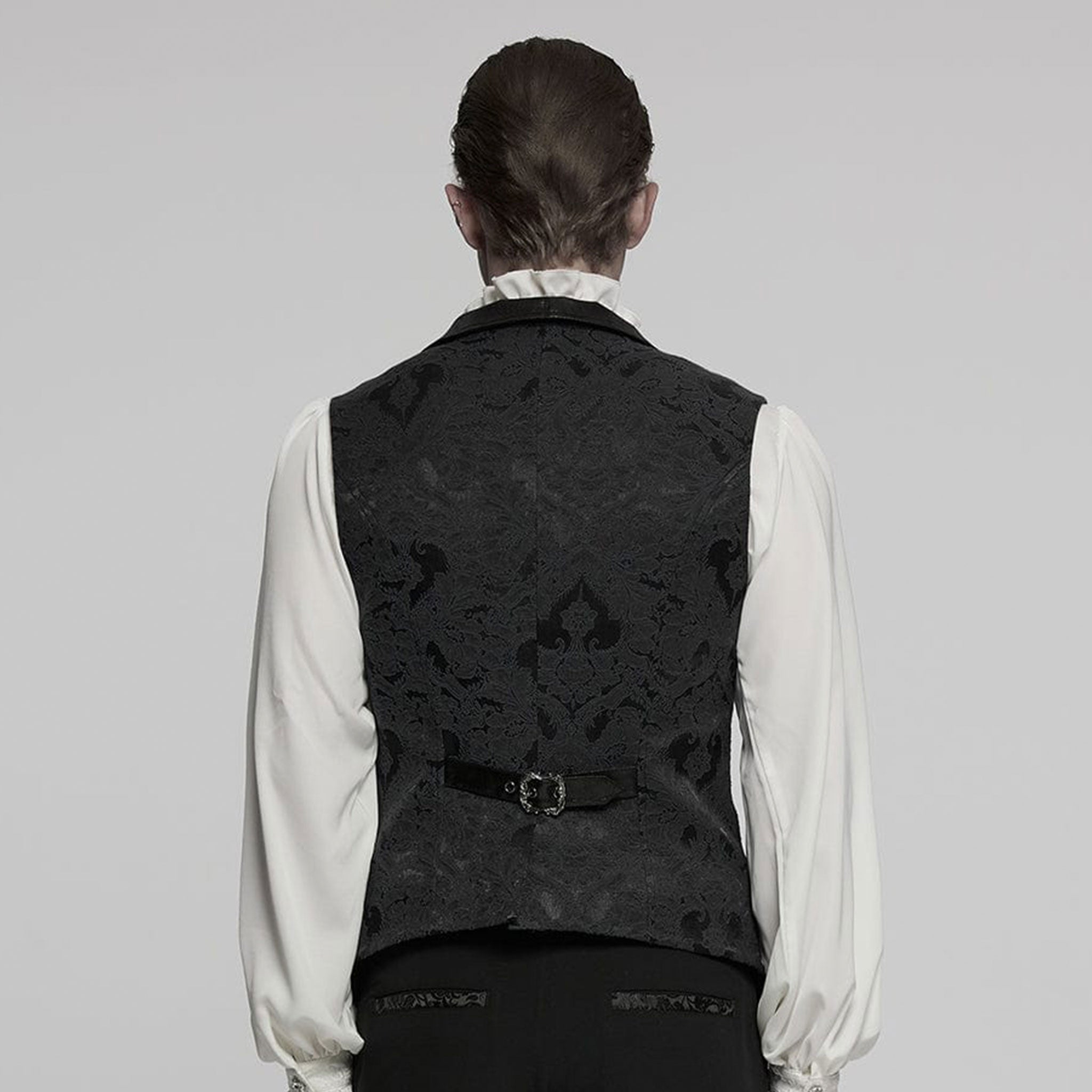 Polyester cotton elastane Spandex embroidered-fabric jacquard brocade leather faux-leather textured floral top outerwear vest waistcoat buckle-front adjustable scalloped-hem long-points elongated tailored-fit fashion alternative alt-fashion goth gothic victorian victorian-inspired steampunk costume cosplay halloween vampire batwing male masculine masc mens menswear guys dudes black