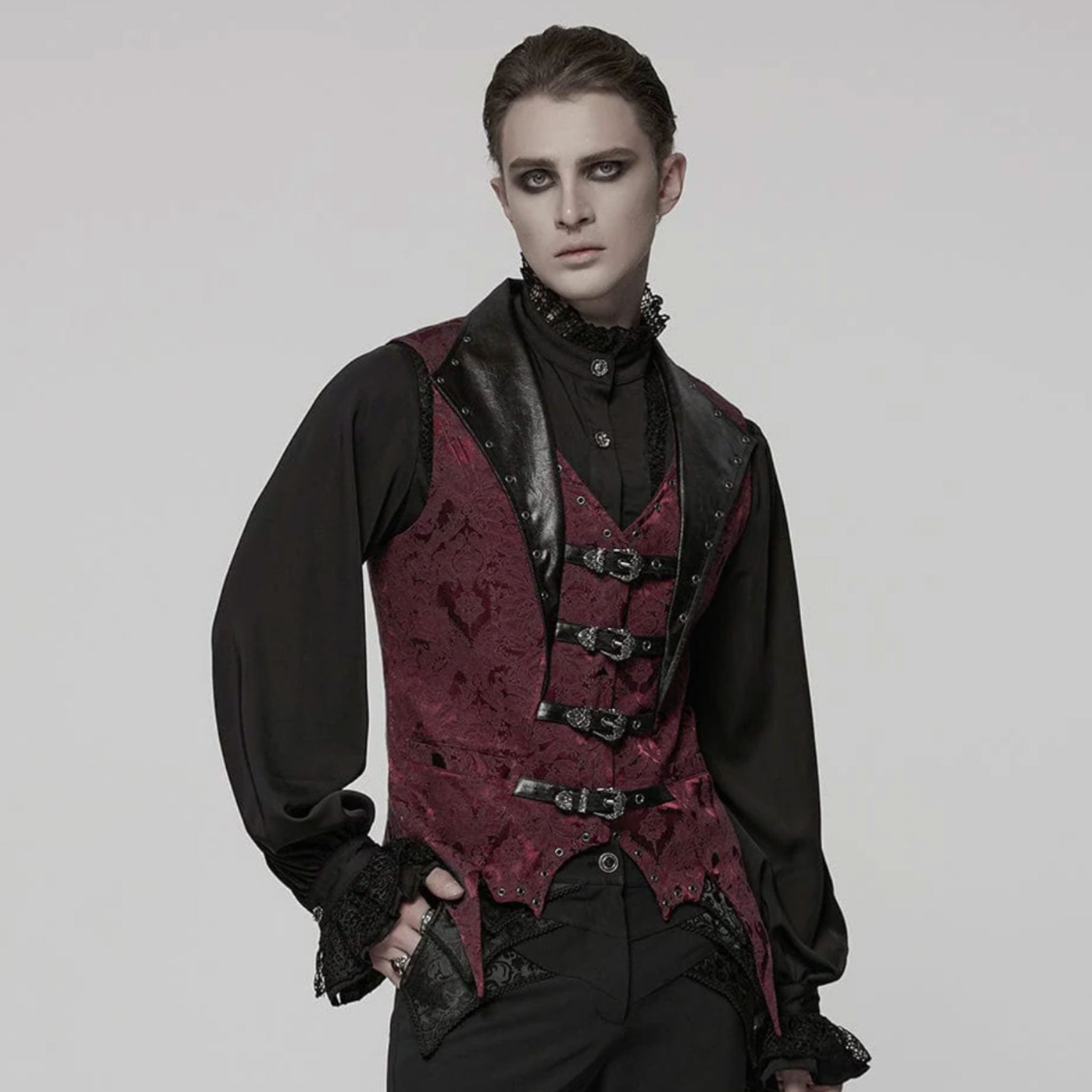 Polyester cotton elastane Spandex embroidered-fabric jacquard brocade leather faux-leather textured floral top outerwear vest waistcoat buckle-front adjustable scalloped-hem long-points elongated tailored-fit fashion alternative alt-fashion goth gothic victorian victorian-inspired steampunk costume cosplay halloween vampire batwing male masculine masc mens menswear guys dudes black red