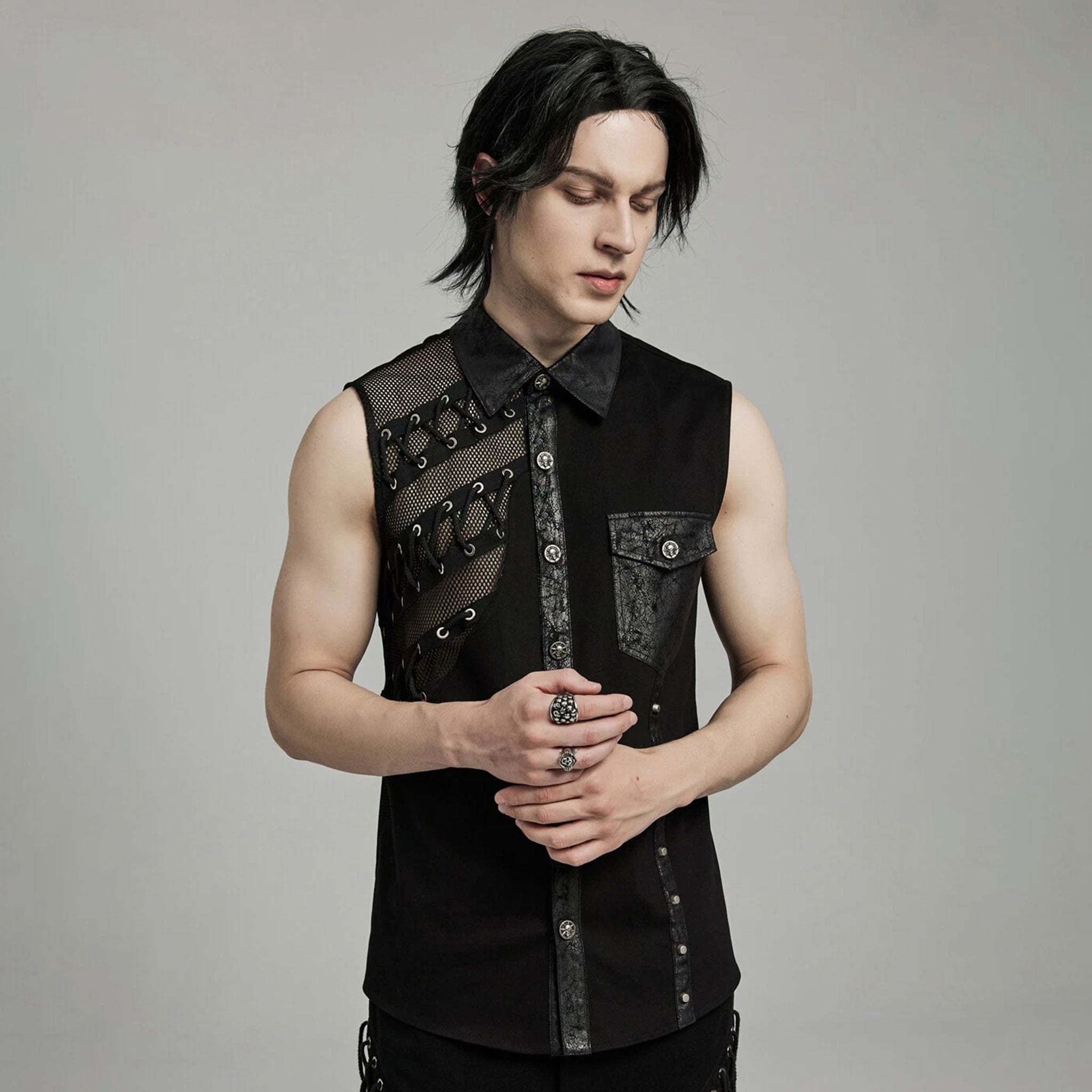 Cotton elastane polyester faux-leather fishnet fish-net mesh apparel top sleeveless vest laced-sides mesh-splice strappy rivet-detail eyelet-accent button-up front-closure skull-button collared lapels fitted soft flexible edgy dark fetish fashion alt-fashion punk goth gothic cyber clubbing clubwear industrial costume cosplay halloween spooky afterdark male masculine masc mens guys dudes black