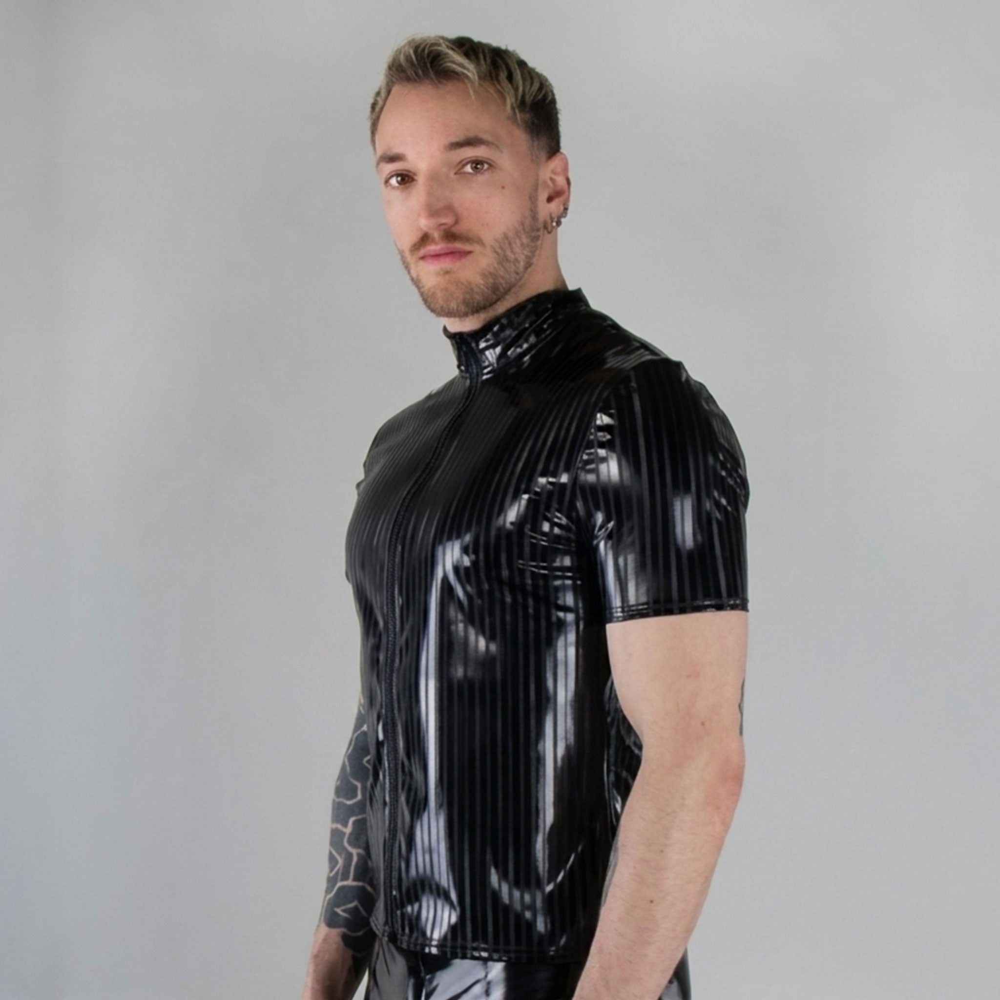 PVC vinyl PU polyurethane PES polyester elastane apparel top shirt pin-stripe pinstripe stripes striped contrast-stripes turtleneck shortsleeve short-sleeve sleeves sleeved zipper front-zip glossy shiny matte bold sophisticated fetish fashion alt-fashion punk goth gothic cyber clubbing clubwear kink kinky kinkwear male masculine masc mens guys dudes black
