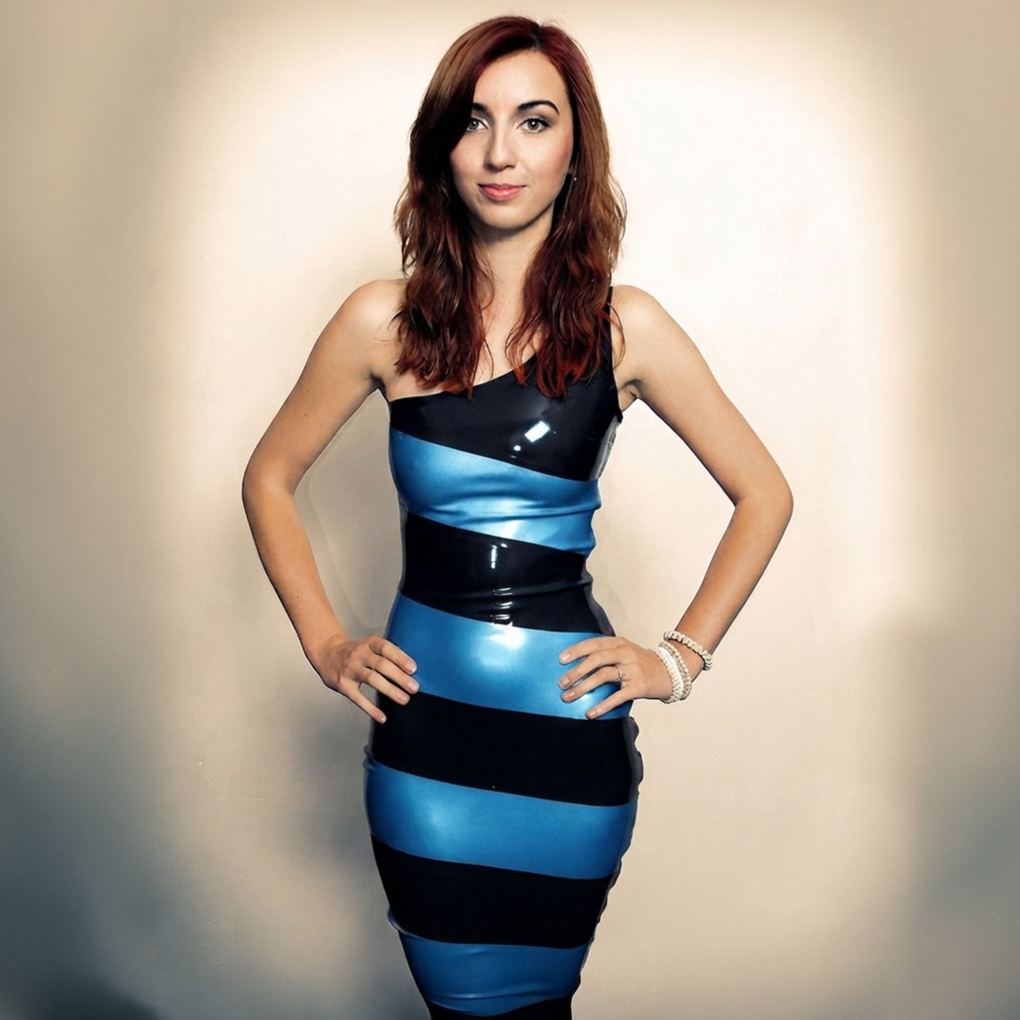 Latex rubber apparel dresses pencil-dress pencil-cut knee-length asymmetrical singlet-shoulder open-shoulder sleeveless side-zip zipper one-of-a-kind shiny glossy fetish fashion alt-fashion alternative glam clubwear party kink kinky kinkwear costume cosplay halloween female femme feminine womens black-blue 