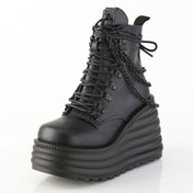 Vegan-leather vegan-friendly foorwear shoes boot ankle-boot wedge platform-wedge cushioned ribbed laceup lace-up laceup-front inside-zip zipper O-ring hanging-chains removable round-toe ultraviolet blacklight black-light UV-light glow-in-the-dark skeleton goth gothic punk rock fetish fashion alt-fashion spooky halloween morte female femme feminine women black purple