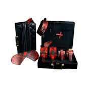 Red crocodile-print bondage kit, 8-piece BDSM set, vegan leather bondage travel kit, luxury restraint set, Fetish Factory bondage gear.