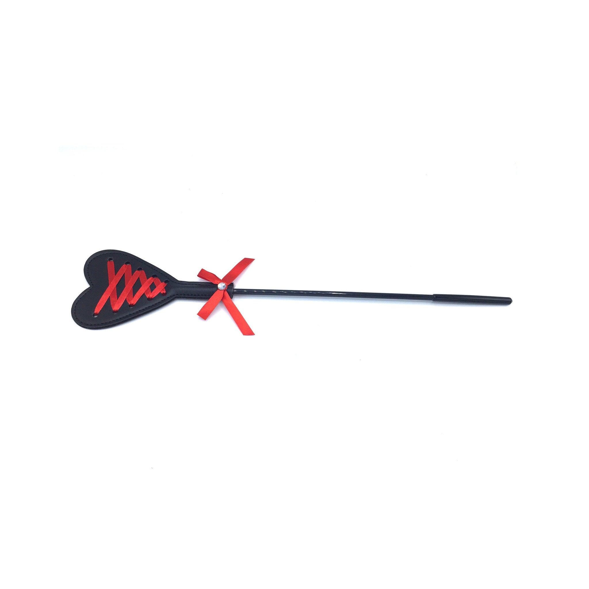Heart riding crop, red ribbon corset design, BDSM whip, impact play toy, vegan leather crop, fetish gear, roleplay accessory.
